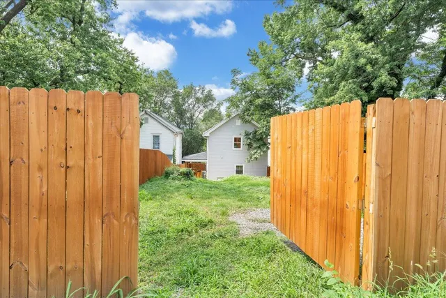 a view of a backyard with garden