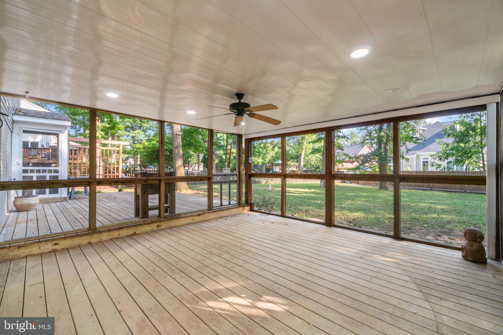 1432 Oak Bluff Road Edgewater, MD 21037 - Photo 41 of 46 Lower-Level Screened in Porch
