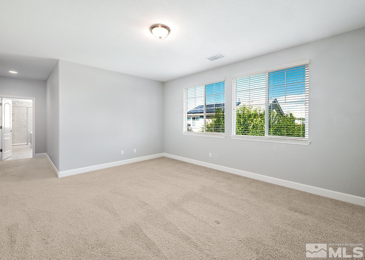 10843 Walnut Ridge Drive Reno, NV 89521 - Photo 13 of 26 an empty room with windows
