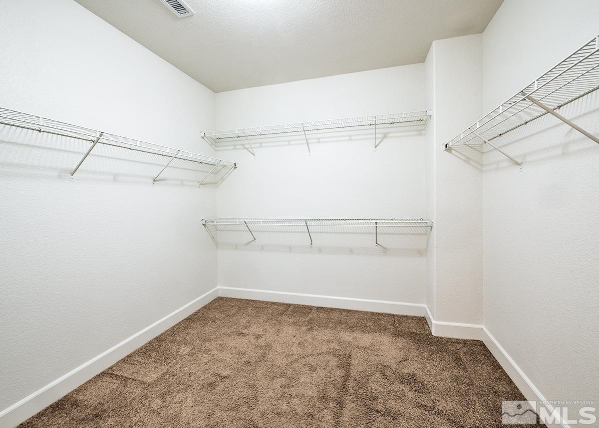 10843 Walnut Ridge Drive Reno, NV 89521 - Photo 15 of 26 a view of a room with racks on the wall