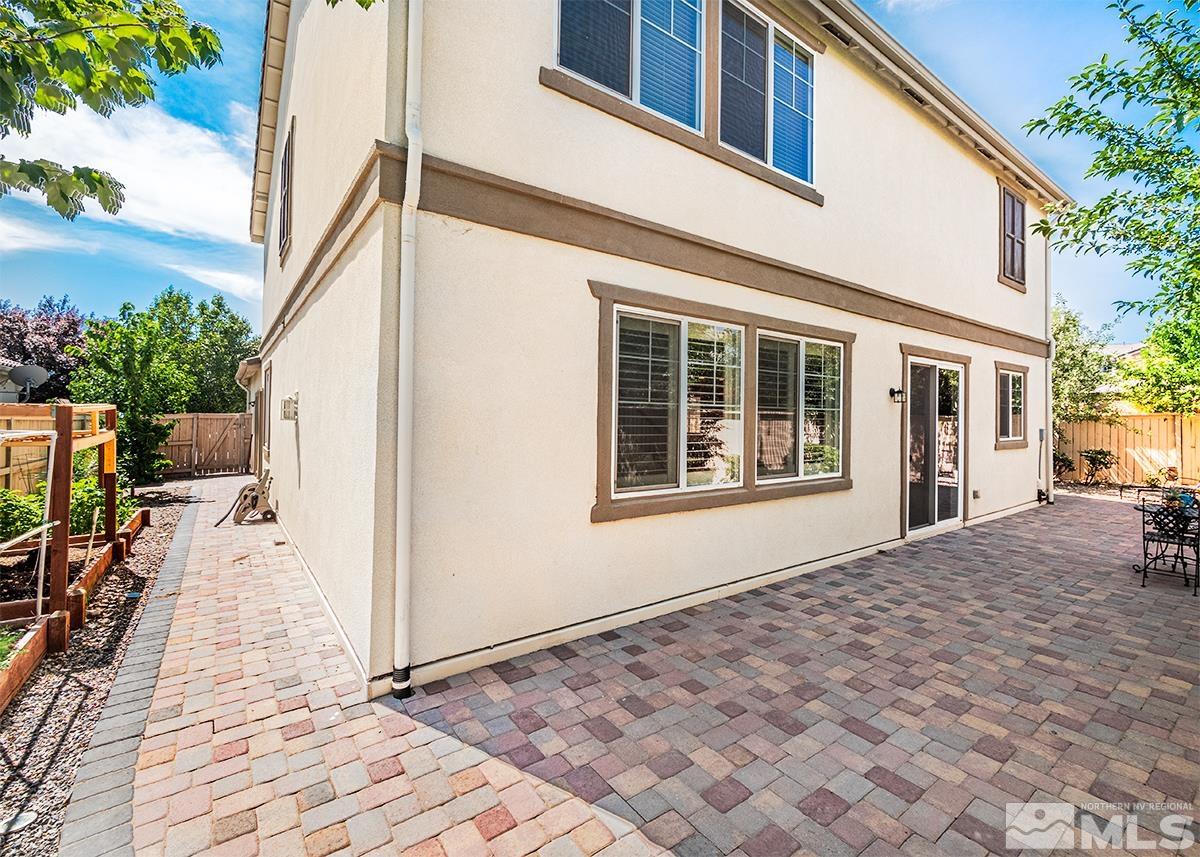 10843 Walnut Ridge Drive Reno, NV 89521 - Photo 24 of 26 a view of a house with a backyard