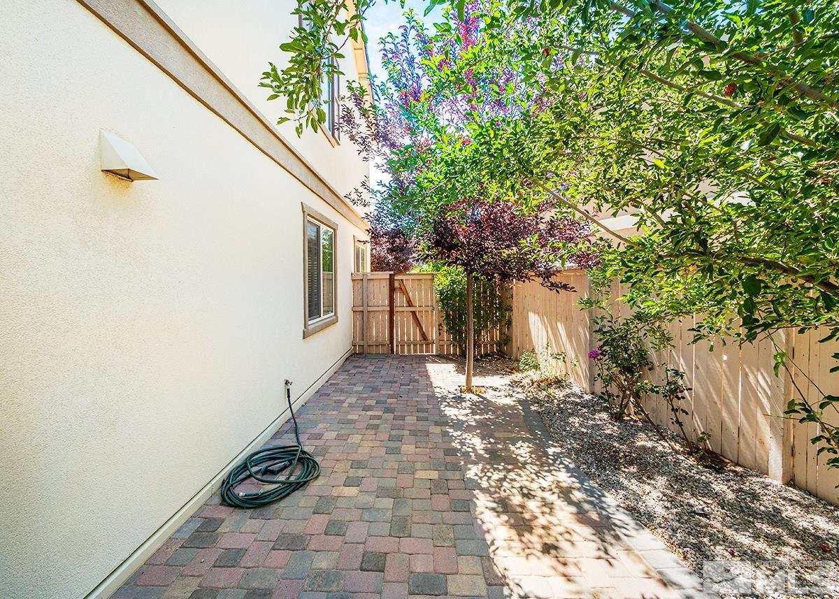 10843 Walnut Ridge Drive Reno, NV 89521 - Photo 26 of 26 a front view of a house with a yard