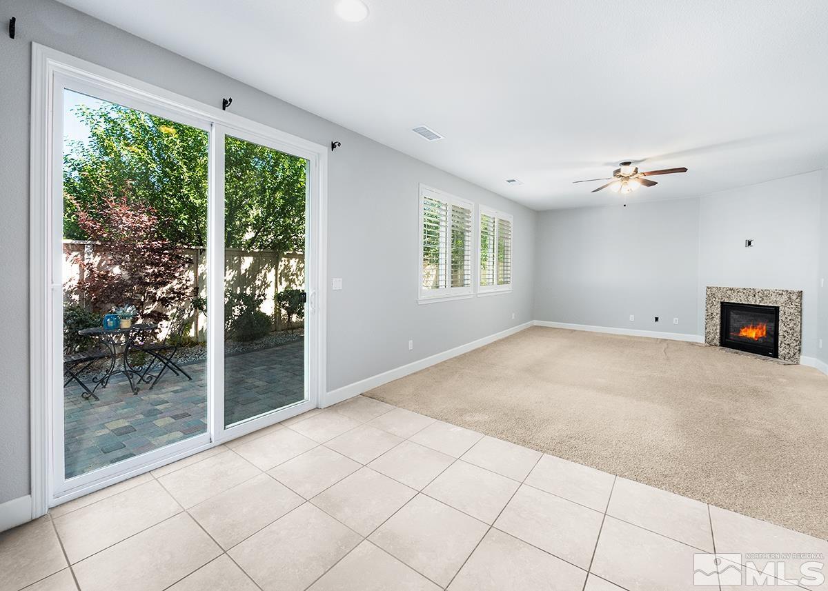 10843 Walnut Ridge Drive Reno, NV 89521 - Photo 10 of 26 a view of an empty room with a window