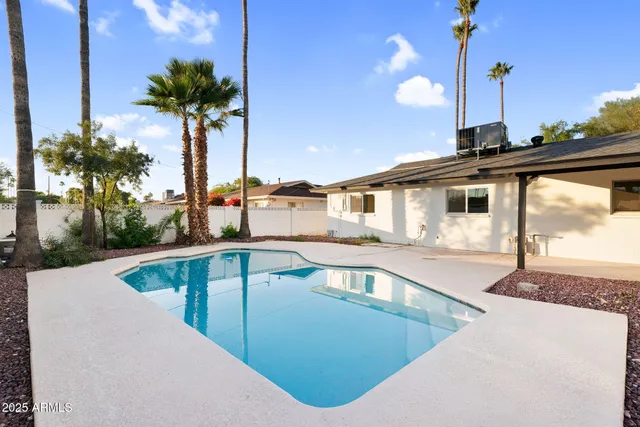 a view of a house with a swimming pool