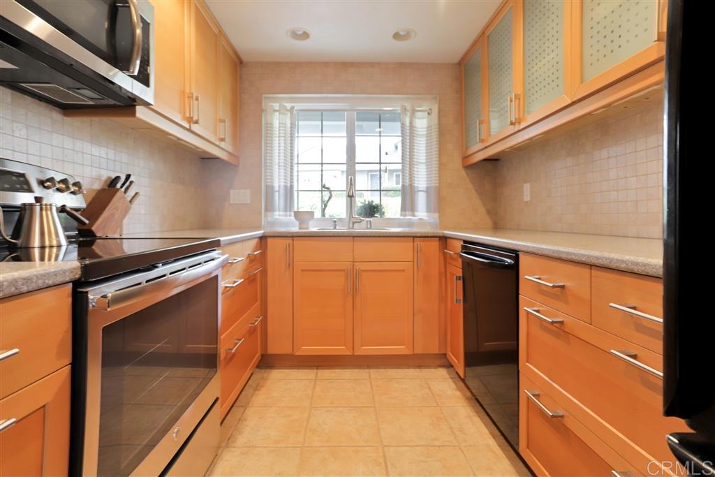 1982 Azure Way Encinitas, CA 92024 - Photo 1 of 1 a view of a kitchen with a sink and dishwasher