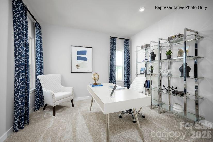 2275 Flicker Road Indian Land, SC 29707 - Photo 11 of 17 a view of a livingroom with furniture and a window
