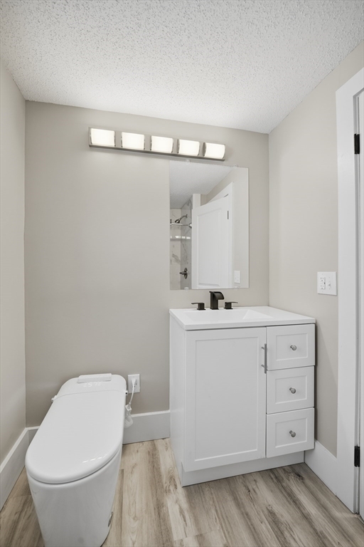 3076 Boston Road Wilbraham, MA 01095 - Photo 22 of 42 a bathroom with a toilet sink and mirror