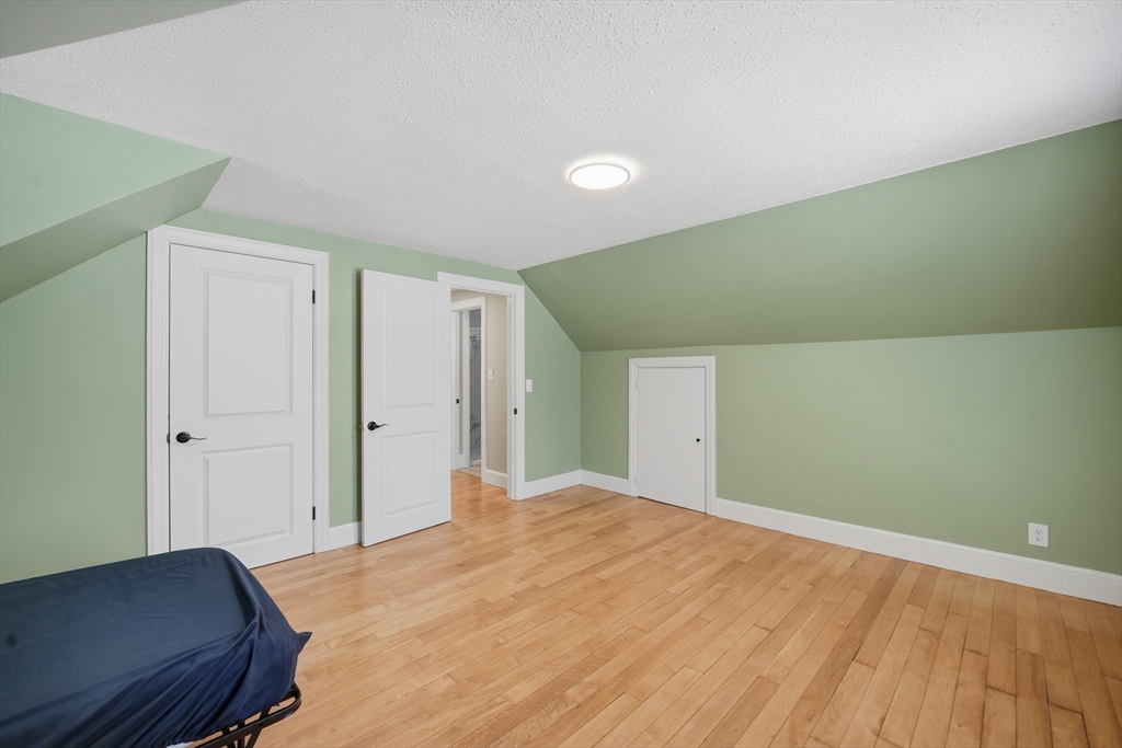 3076 Boston Road Wilbraham, MA 01095 - Photo 25 of 42 a bedroom with a bed and a dresser