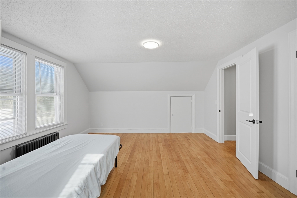 3076 Boston Road Wilbraham, MA 01095 - Photo 30 of 42 a room with a bed and a window