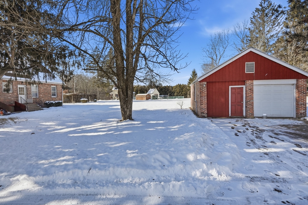 3076 Boston Road Wilbraham, MA 01095 - Photo 36 of 42 a view of a house with a snow in the yard
