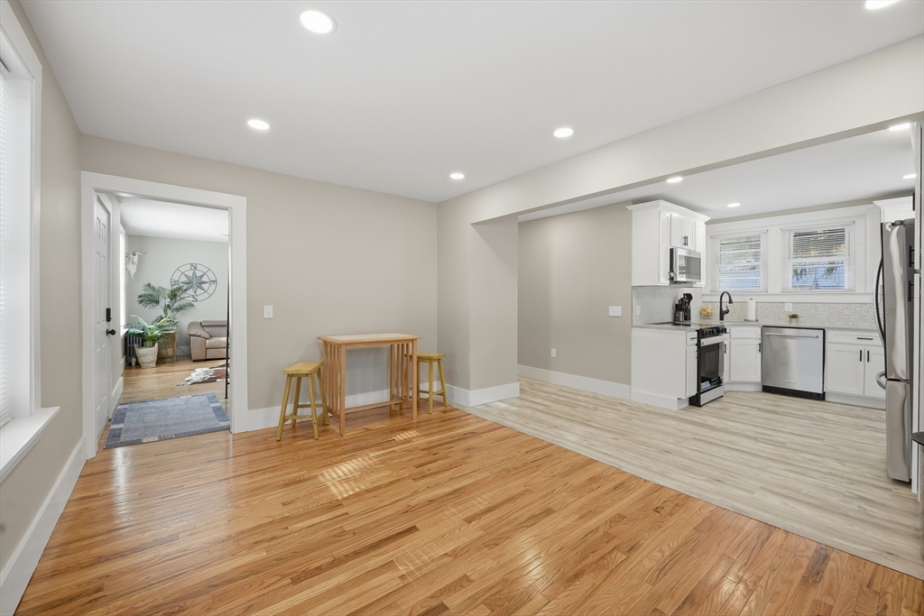 3076 Boston Road Wilbraham, MA 01095 - Photo 8 of 42 a view of a kitchen with white cabinets and stainless steel appliances