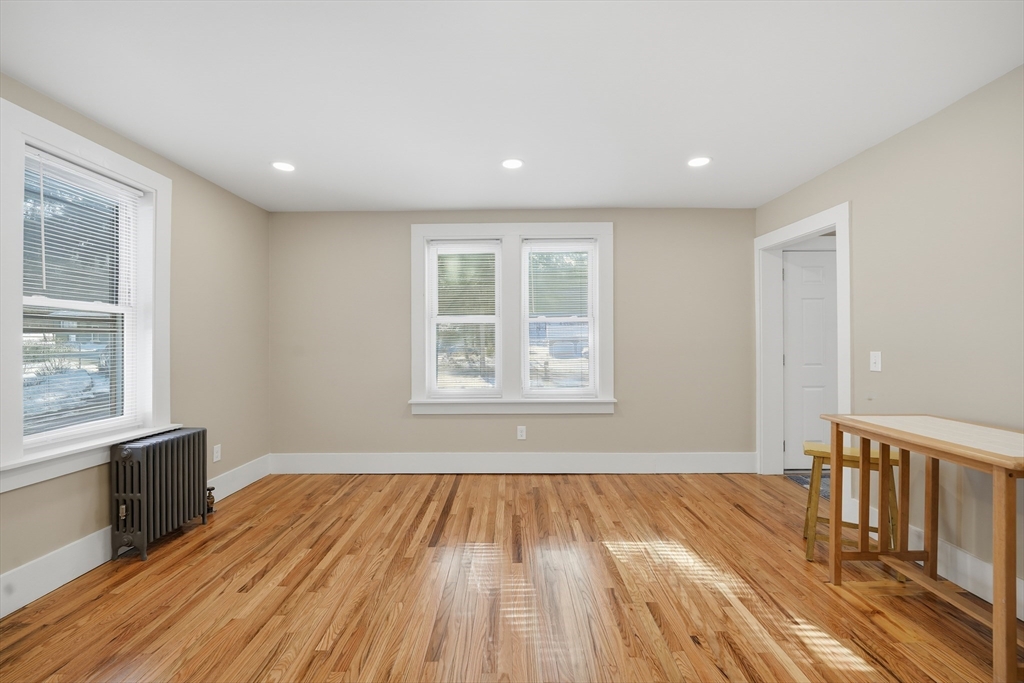 3076 Boston Road Wilbraham, MA 01095 - Photo 10 of 42 a view of a room with wooden floor and windows