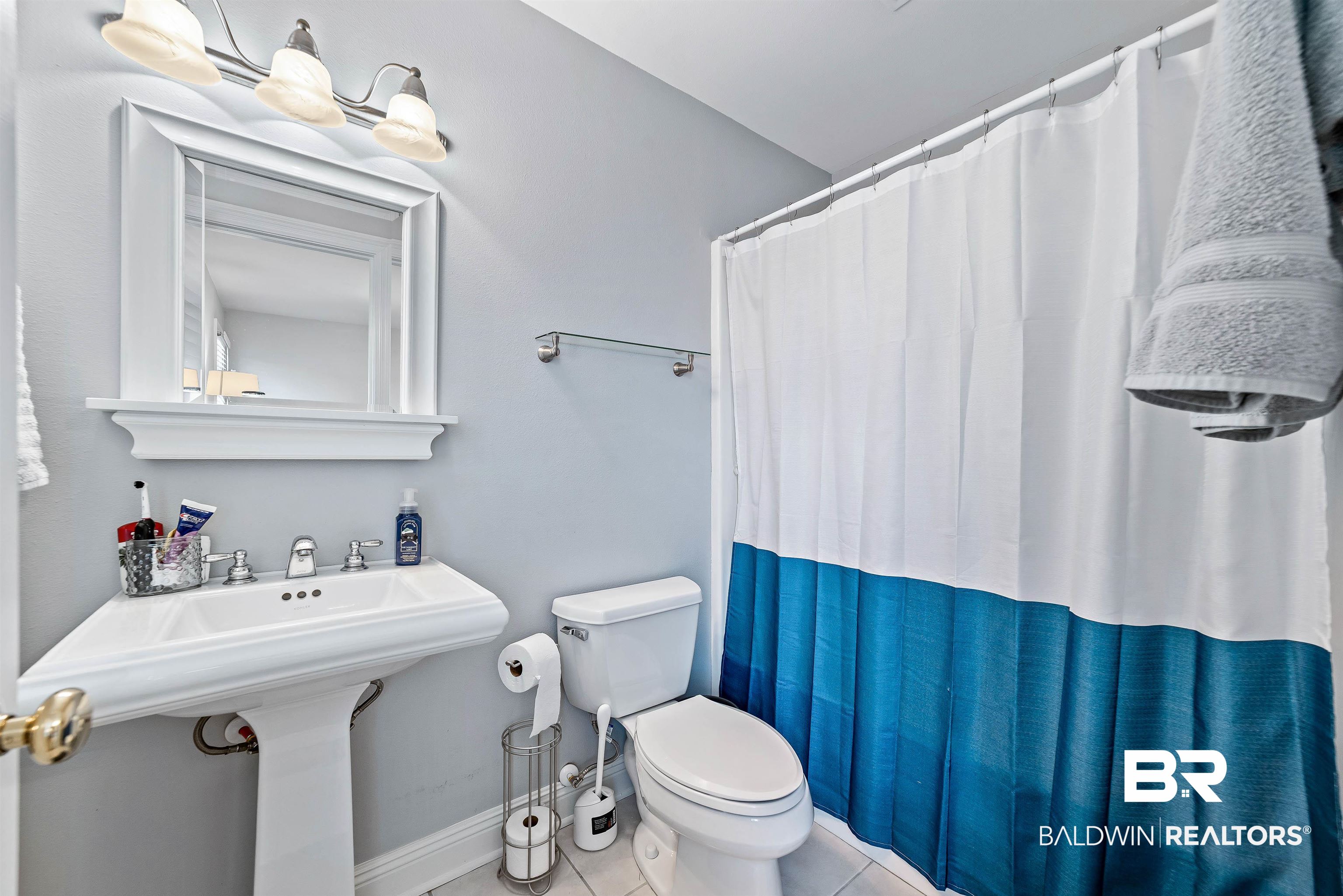 6630 East Quarry Drive Elberta, AL 36530 - Photo 37 of 63 Bathroom with tile patterned floors and curtained shower