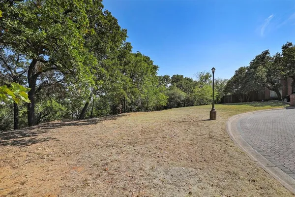 a view of a backyard of a house