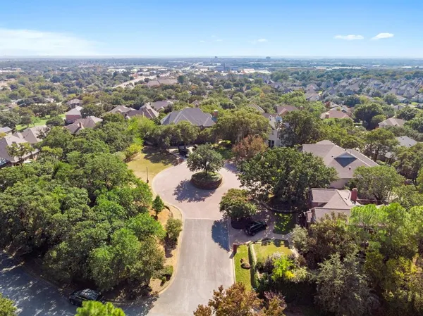 an aerial view of a city with lots of residential buildings