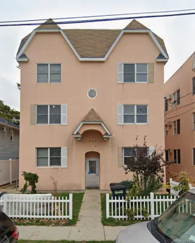 a front view of house with a yard