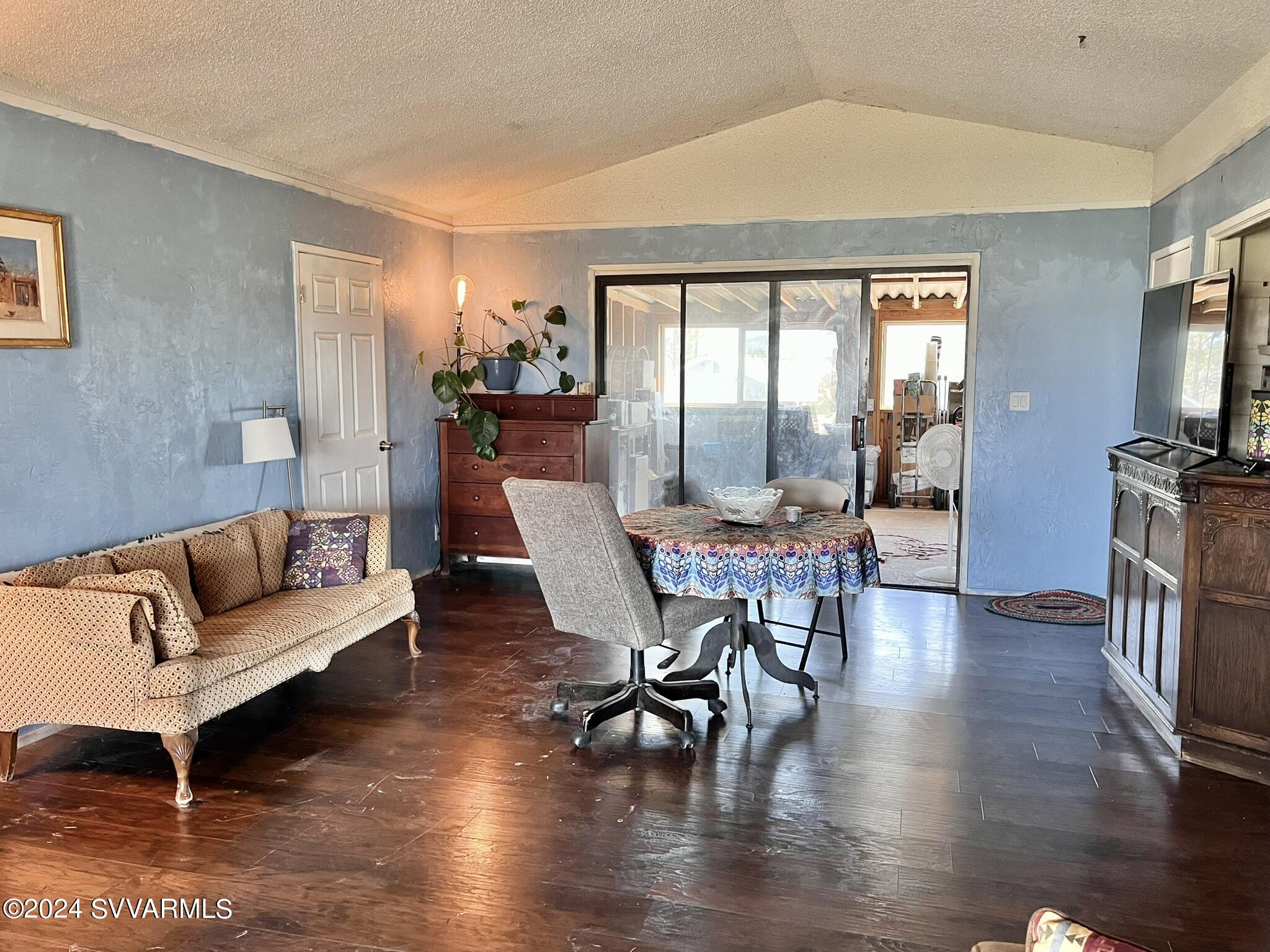 4545 North Drifting Sands Road Rimrock, AZ 86335 - Photo 11 of 52 a living room with fireplace furniture and a flat screen tv