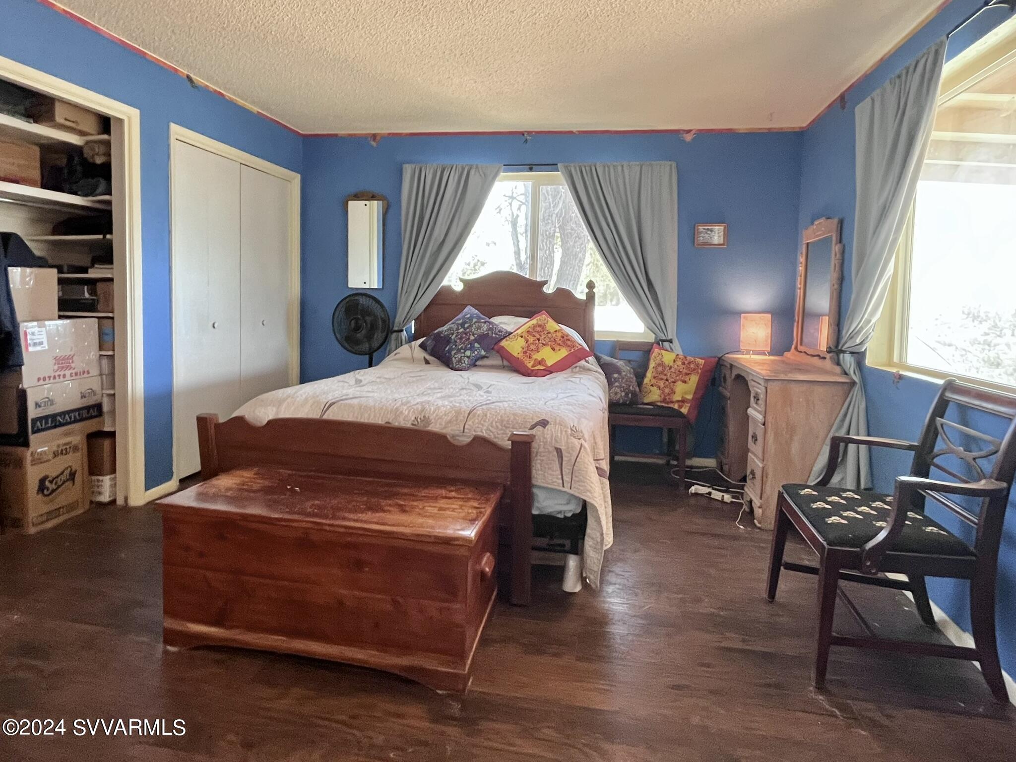4545 North Drifting Sands Road Rimrock, AZ 86335 - Photo 24 of 52 a bedroom with furniture and a window