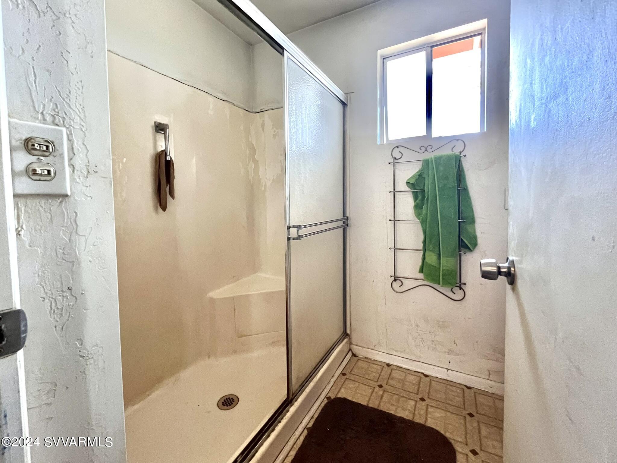 4545 North Drifting Sands Road Rimrock, AZ 86335 - Photo 30 of 52 a bathroom with a shower