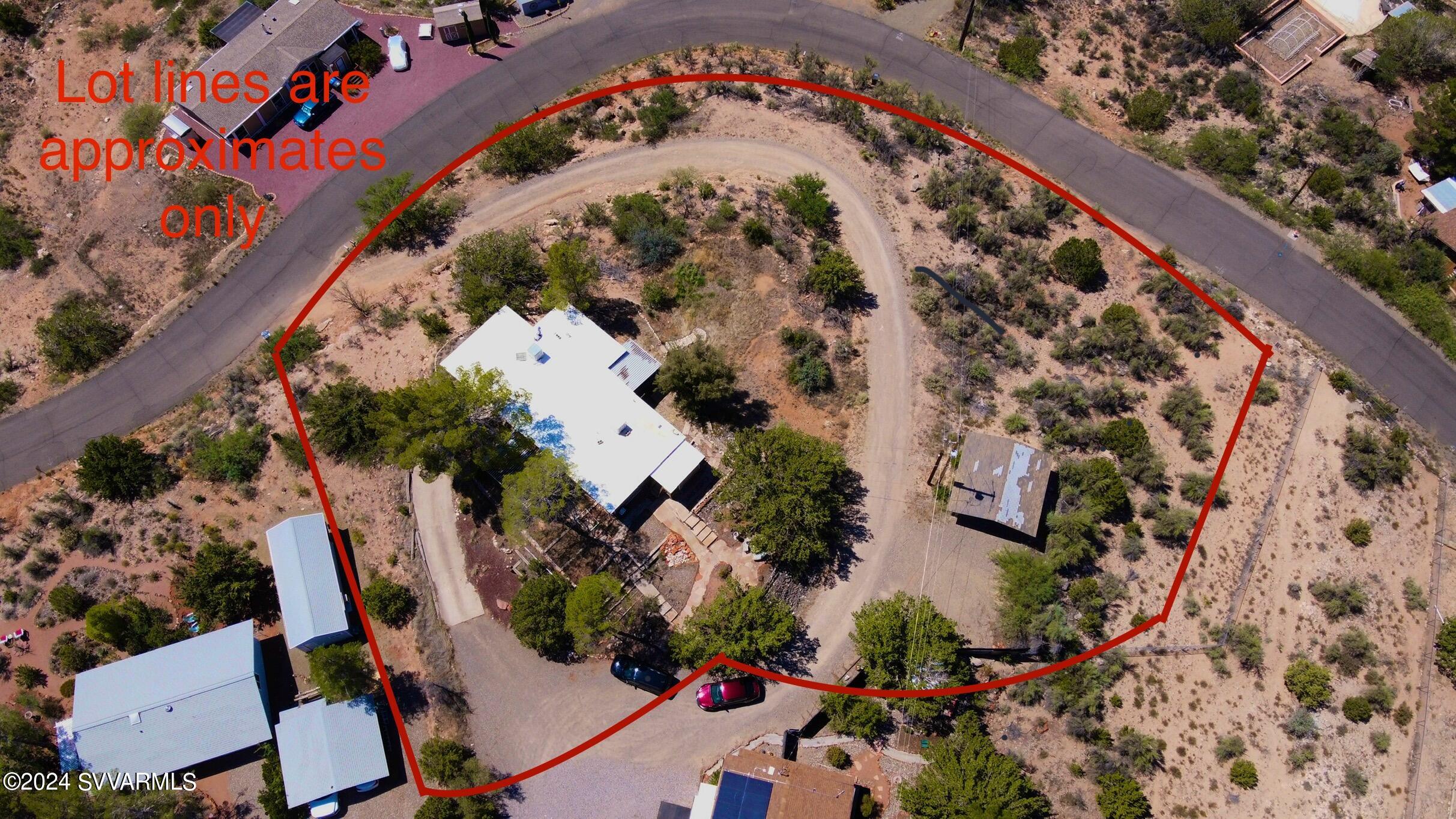 4545 North Drifting Sands Road Rimrock, AZ 86335 - Photo 3 of 52 an aerial view of a house with a yard and garden in the back