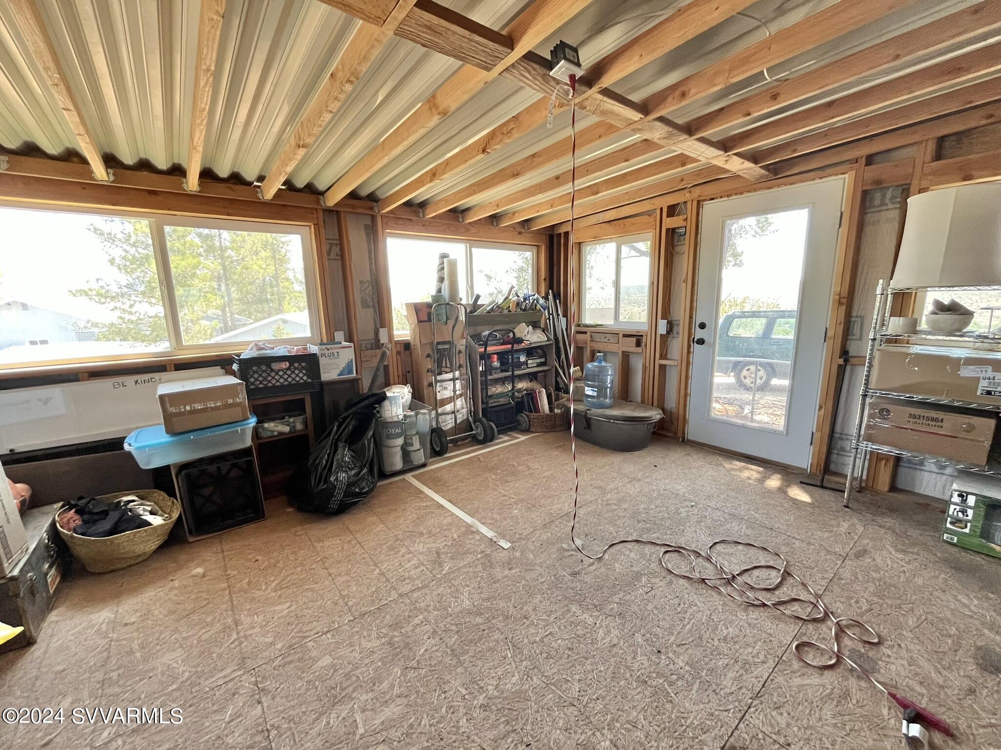 4545 North Drifting Sands Road Rimrock, AZ 86335 - Photo 38 of 52 a living room with furniture and large windows