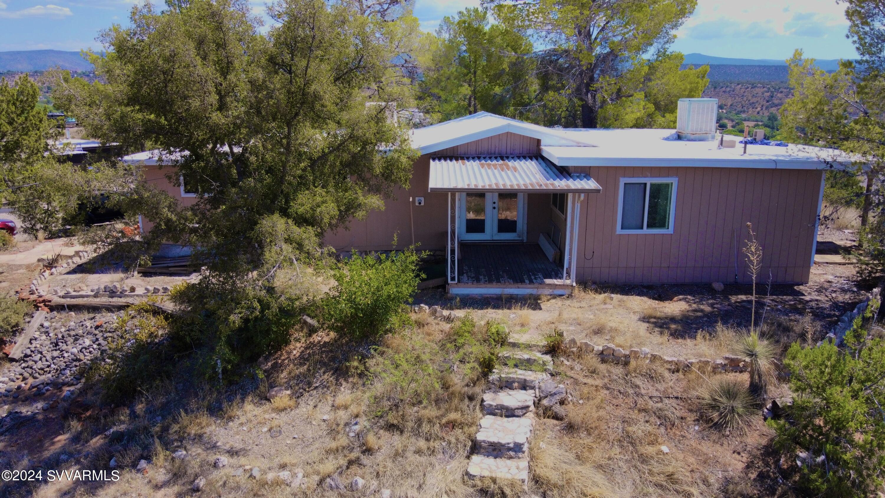 4545 North Drifting Sands Road Rimrock, AZ 86335 - Photo 42 of 52 a view of a house with a yard