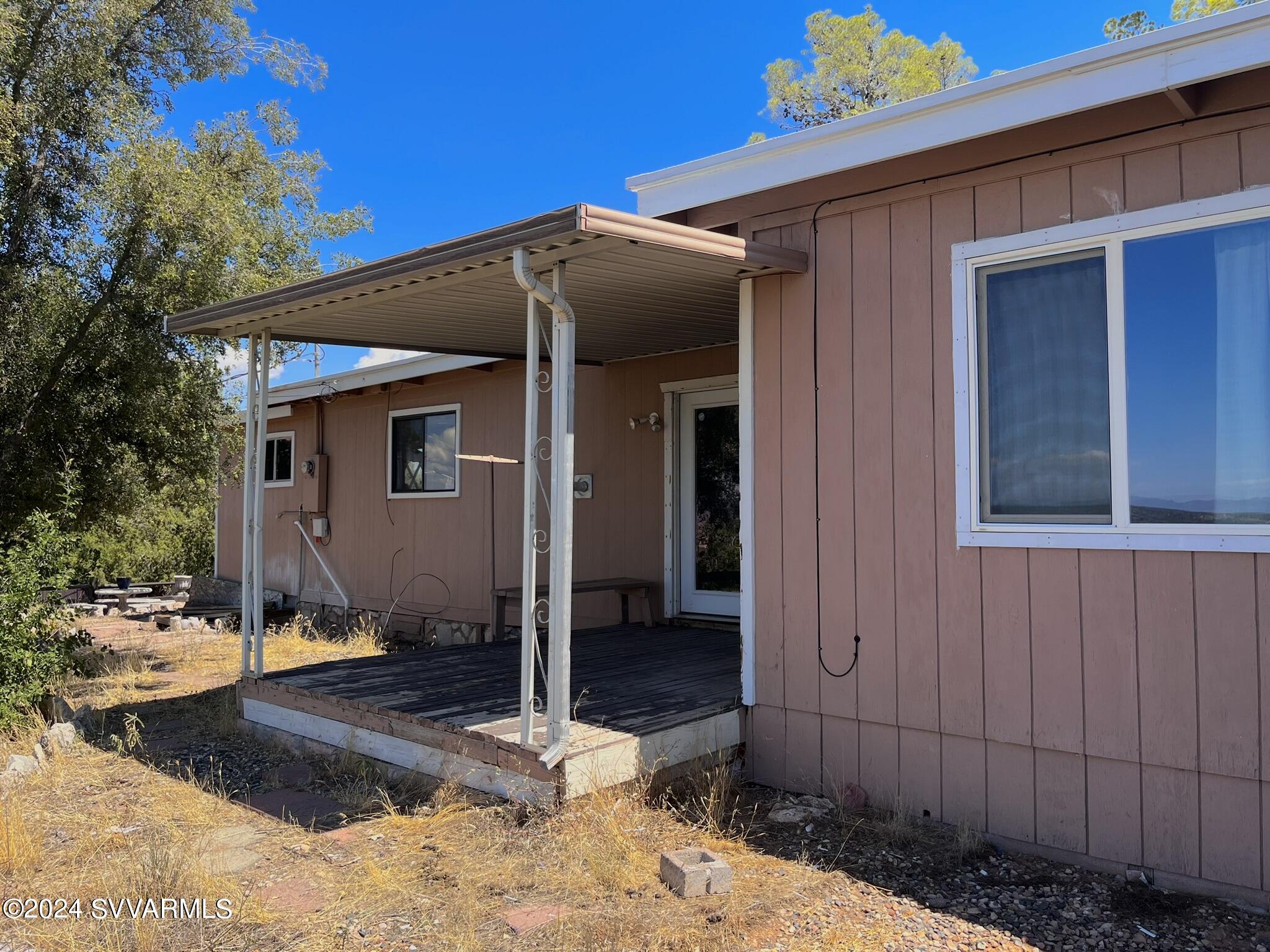4545 North Drifting Sands Road Rimrock, AZ 86335 - Photo 44 of 52 a view of a house with a yard