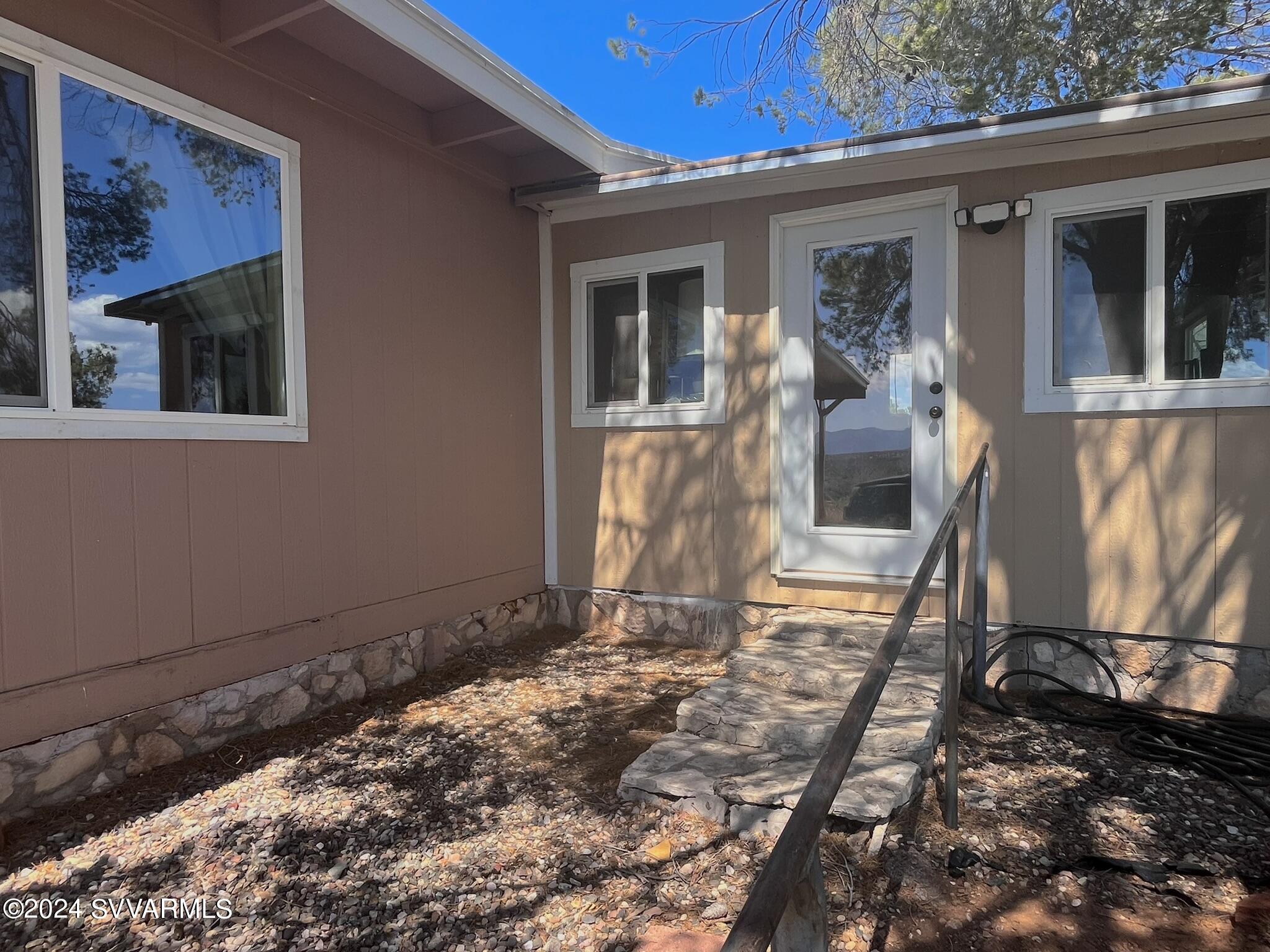 4545 North Drifting Sands Road Rimrock, AZ 86335 - Photo 46 of 52 a front view of a house