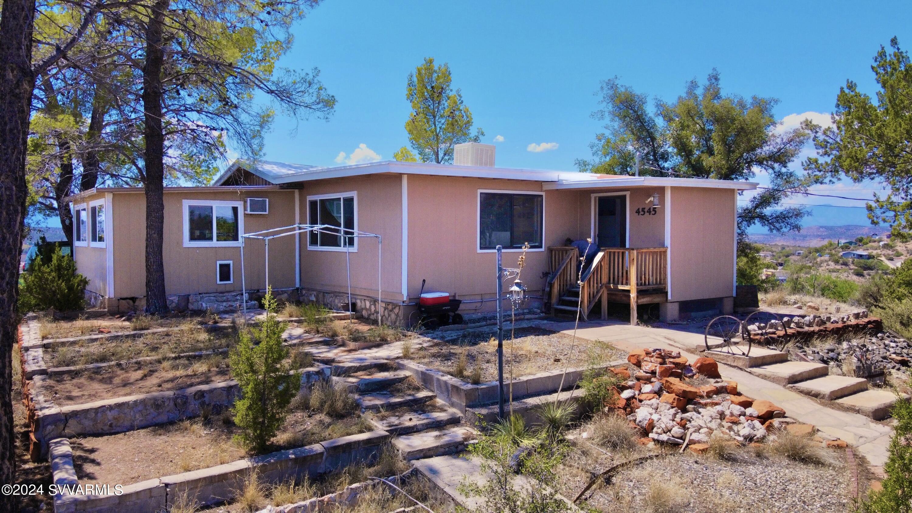 4545 North Drifting Sands Road Rimrock, AZ 86335 - Photo 48 of 52 front view of a house with a yard