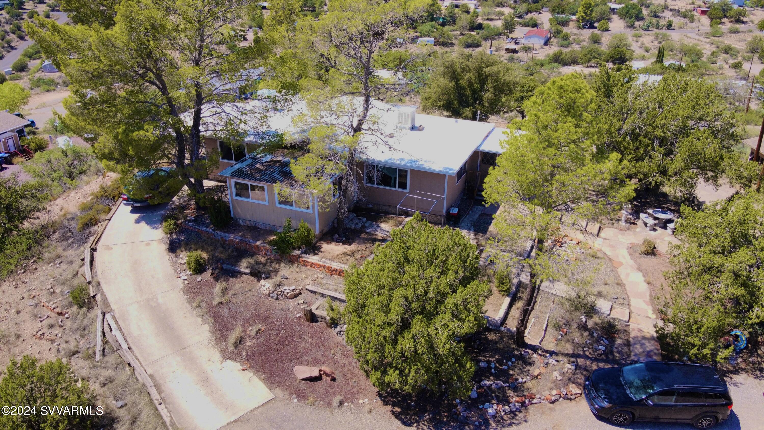 4545 North Drifting Sands Road Rimrock, AZ 86335 - Photo 50 of 52 an aerial view of a house with a yard