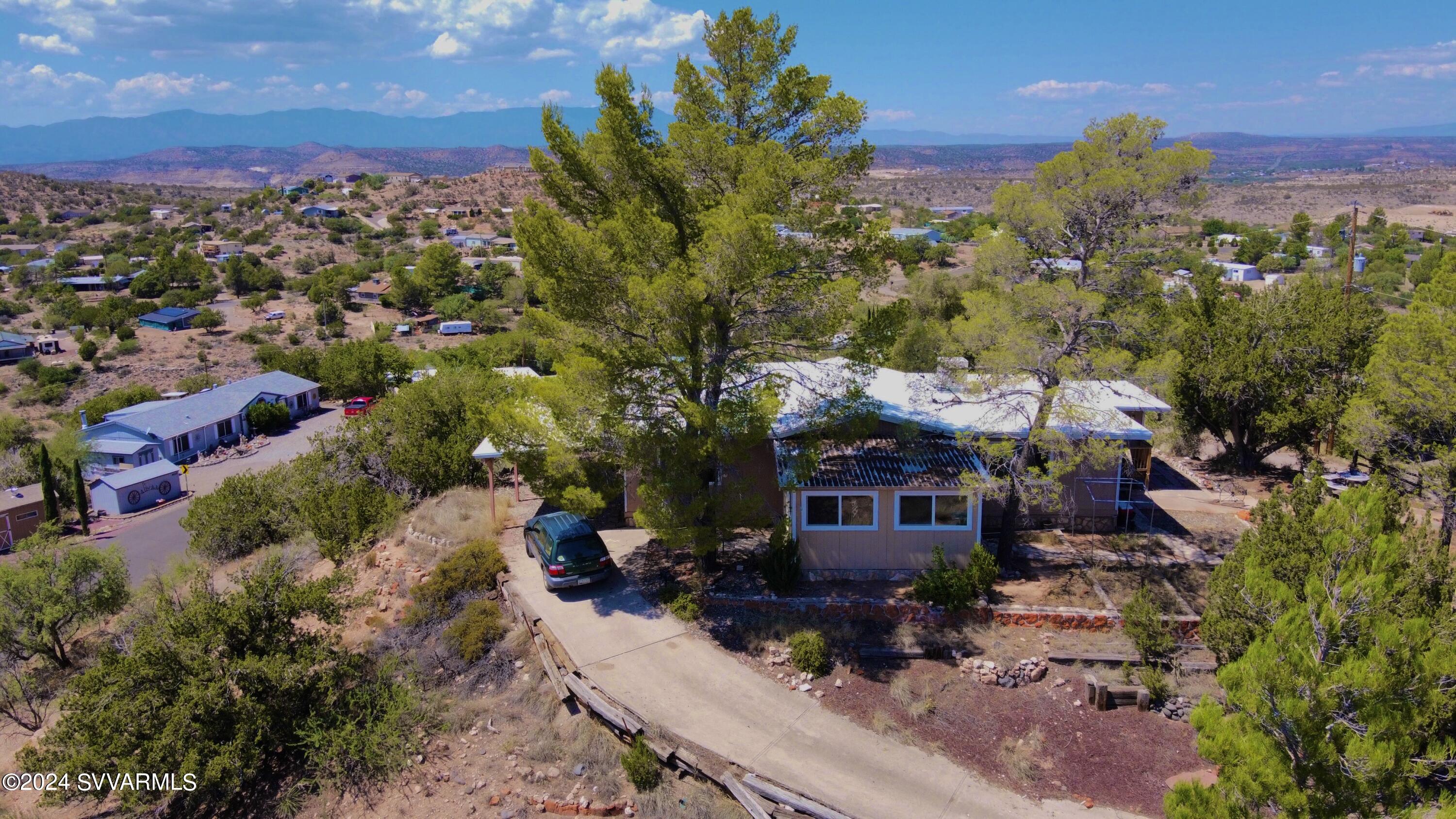 4545 North Drifting Sands Road Rimrock, AZ 86335 - Photo 51 of 52 a view of a house with a yard