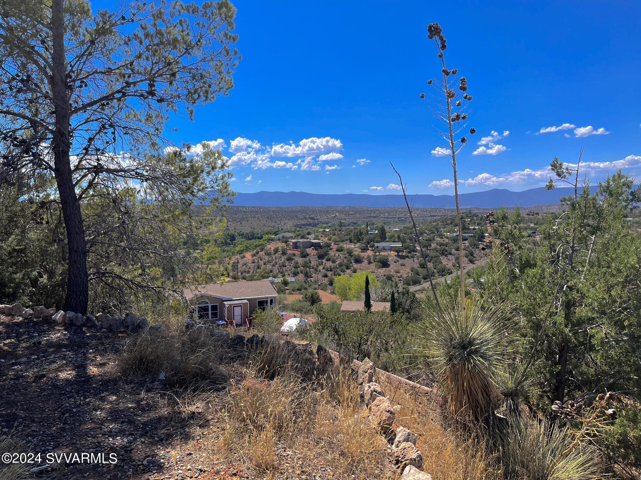 4545 North Drifting Sands Road Rimrock, AZ 86335 - Photo 6 of 52 a view of a building with a yard
