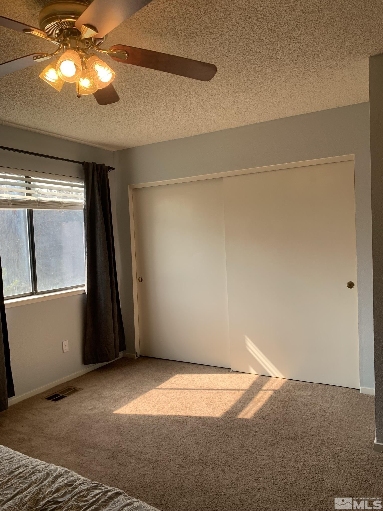 1915 Amarak Way Reno, NV 89523 - Photo 12 of 25 a view of empty room with window