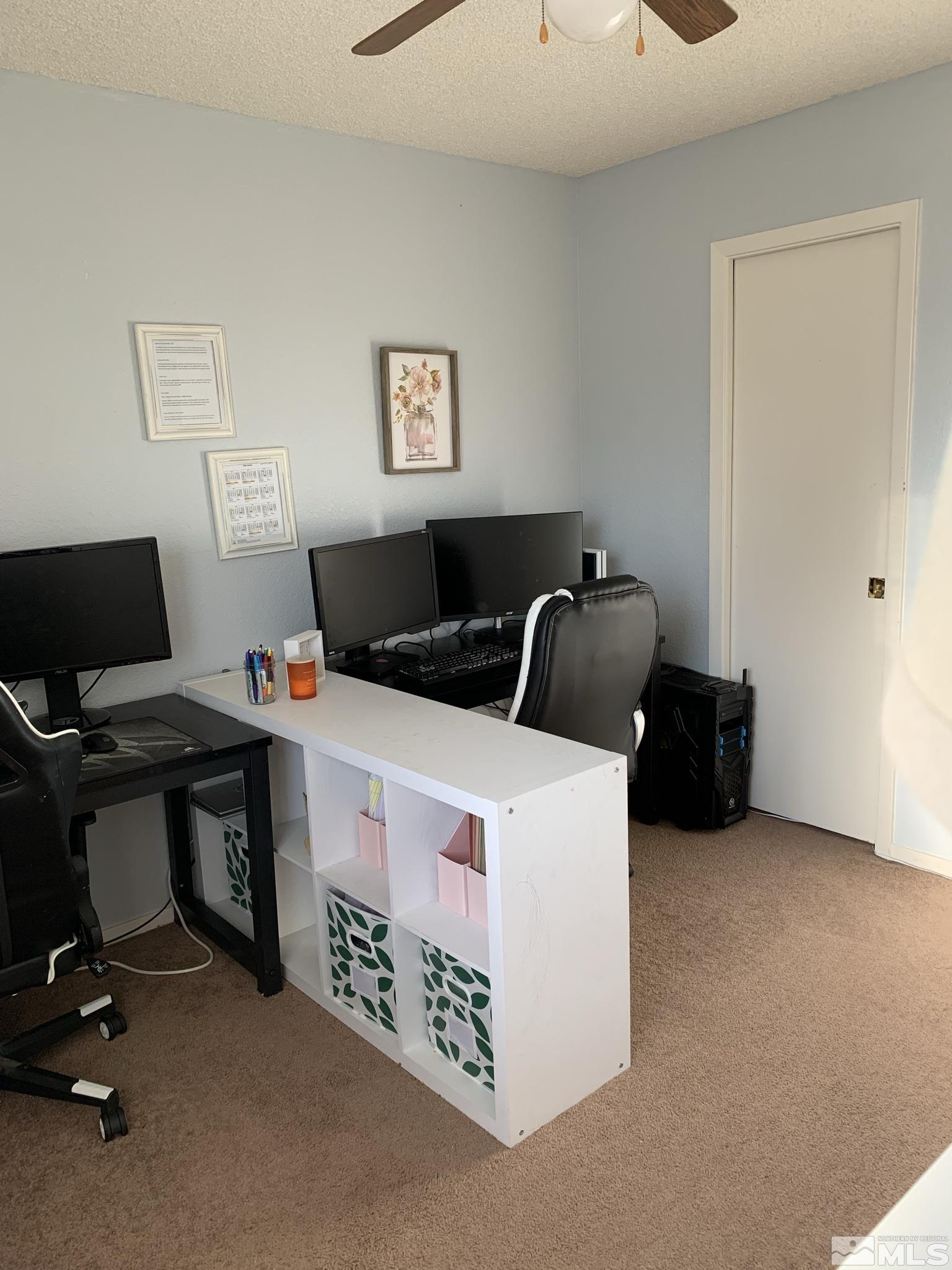 1915 Amarak Way Reno, NV 89523 - Photo 16 of 25 a room with a workspace
