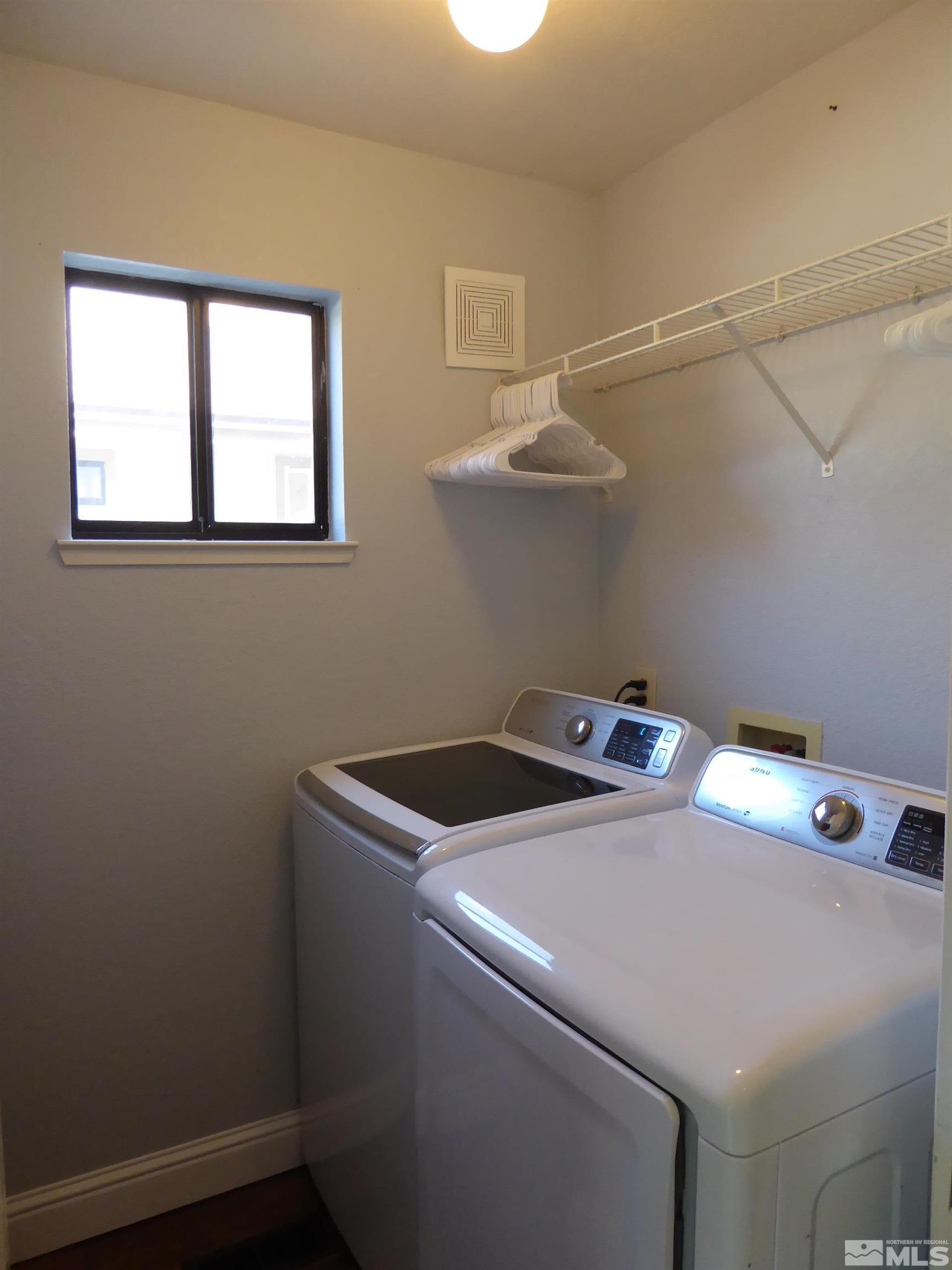 1915 Amarak Way Reno, NV 89523 - Photo 22 of 25 a utility room with dryer and washer