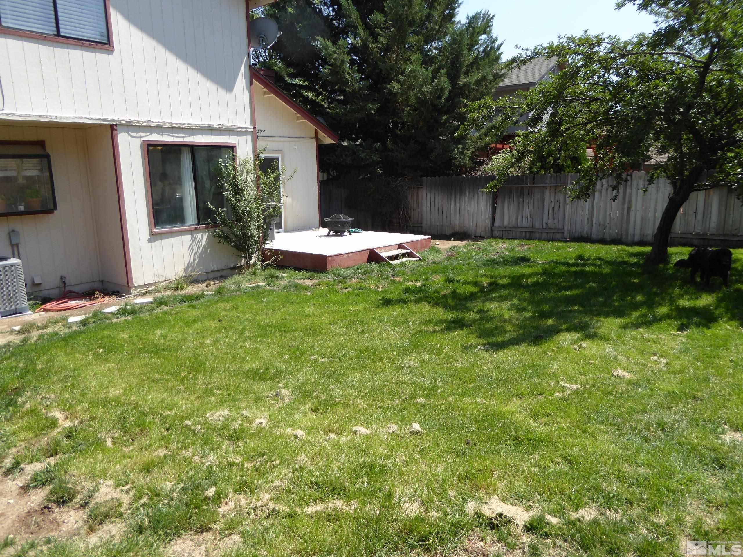1915 Amarak Way Reno, NV 89523 - Photo 25 of 25 a view of a house with backyard and sitting area