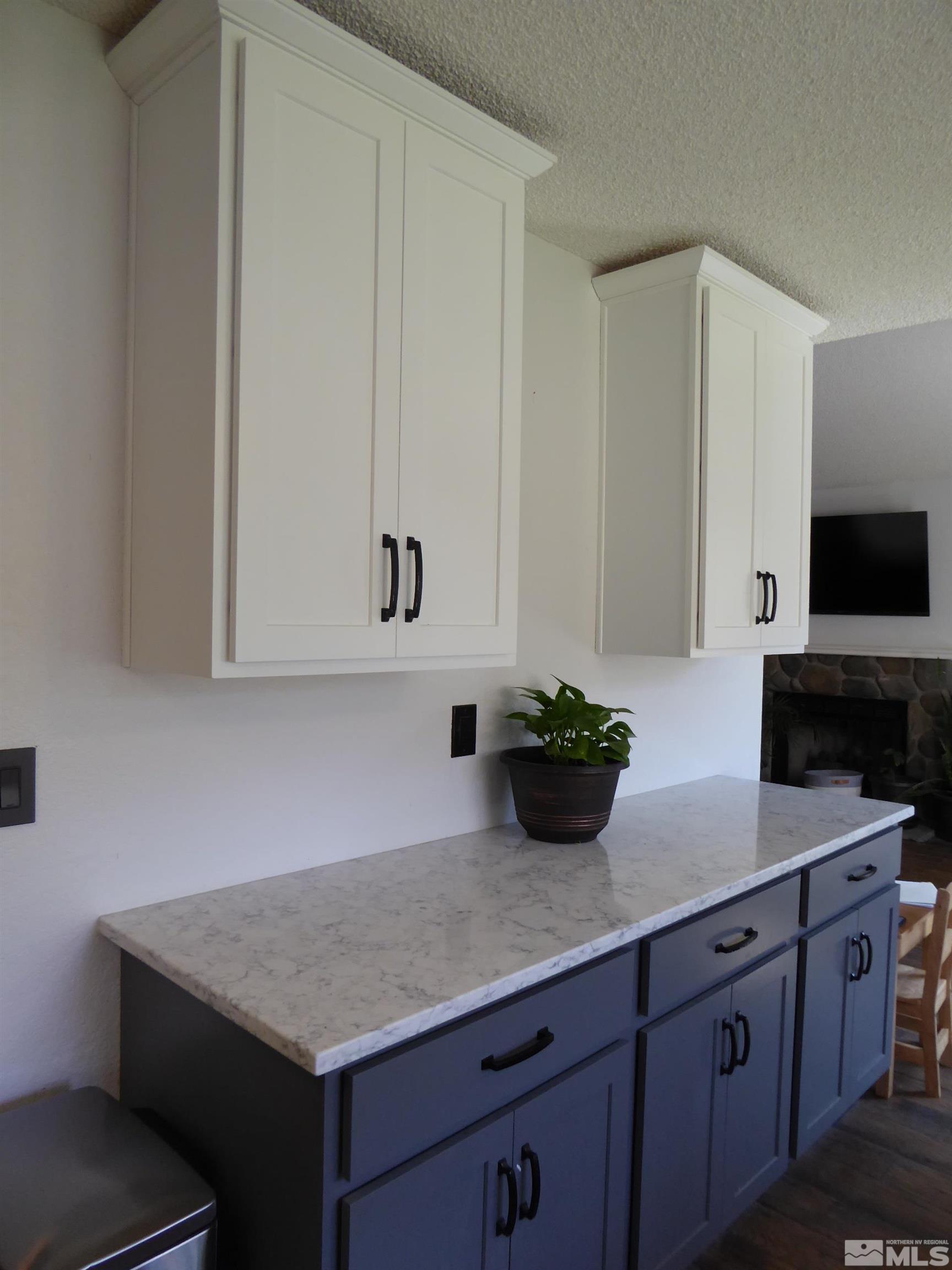 1915 Amarak Way Reno, NV 89523 - Photo 9 of 25 a kitchen with a sink and cabinets