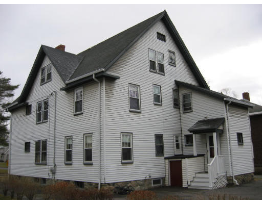 897 Webster Street Needham, MA 02492 - Photo 2 of 8 a front view of a house with windows