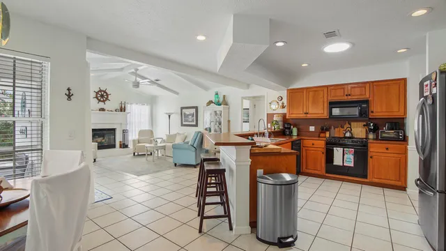 a kitchen with stainless steel appliances lots of counter top space
