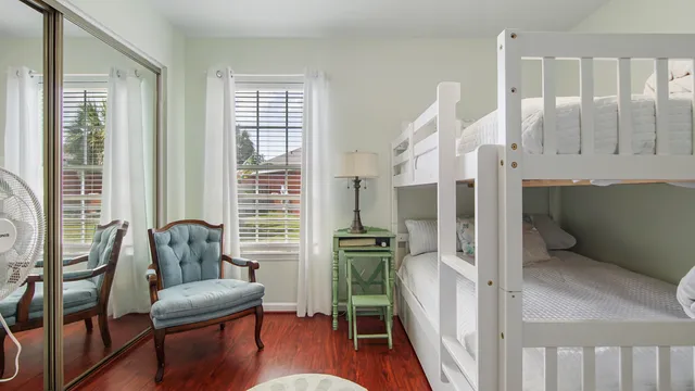 a room with furniture and wooden floor