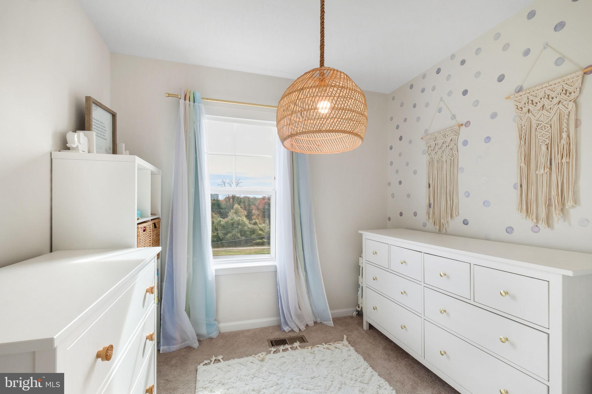 15635 Trolley Lane Silver Spring, MD 20906 - Photo 26 of 41 a room with furniture a washer and dryer