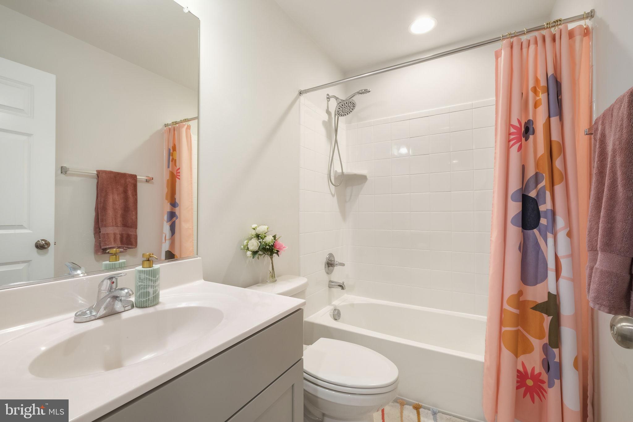 15635 Trolley Lane Silver Spring, MD 20906 - Photo 27 of 41 a bathroom with a sink toilet tub and shower