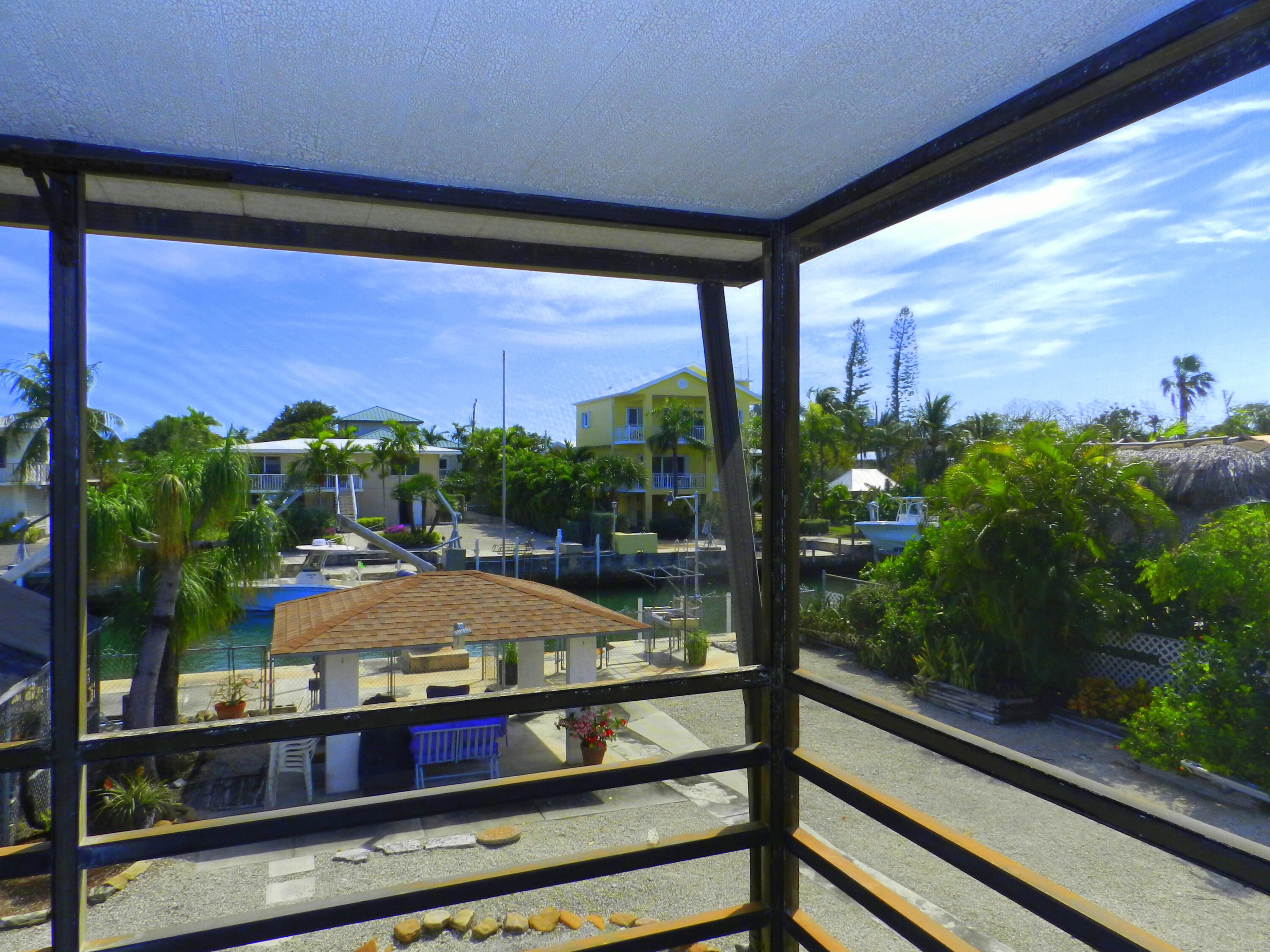 138 Bessie Road Tavernier, FL 33070 - Photo 20 of 24 Upstairs Screened Porch