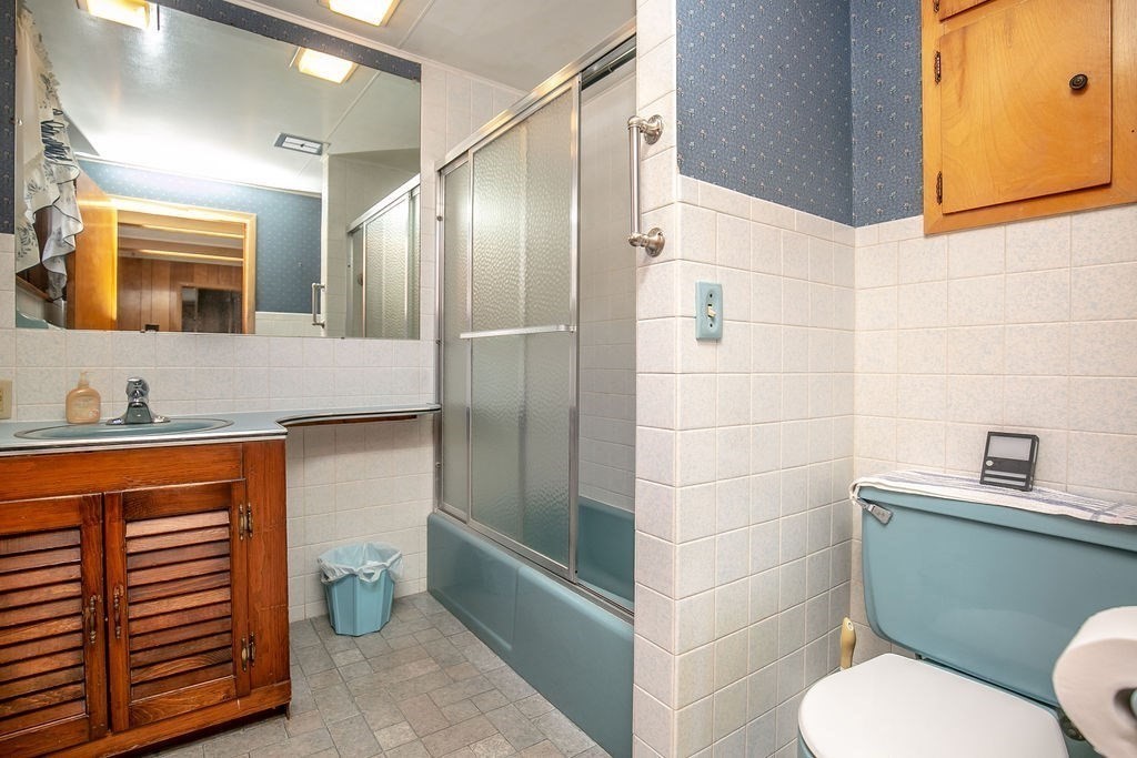 231 River Road Florida, MA 01367 - Photo 12 of 40 a bathroom with a granite countertop sink toilet and shower