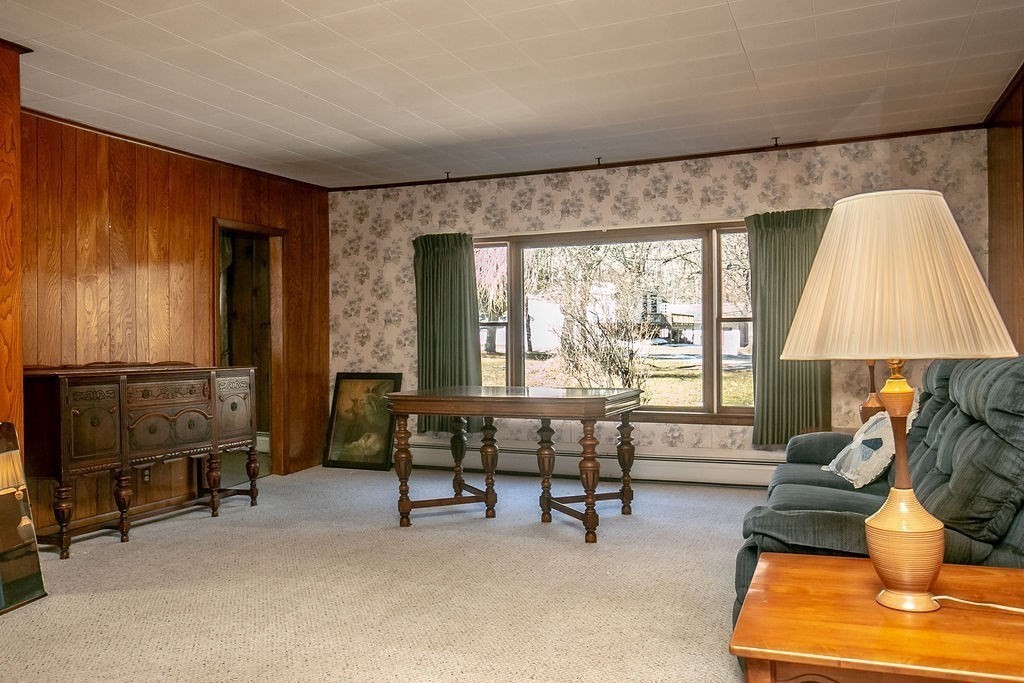 231 River Road Florida, MA 01367 - Photo 17 of 40 a living room with furniture and a large window