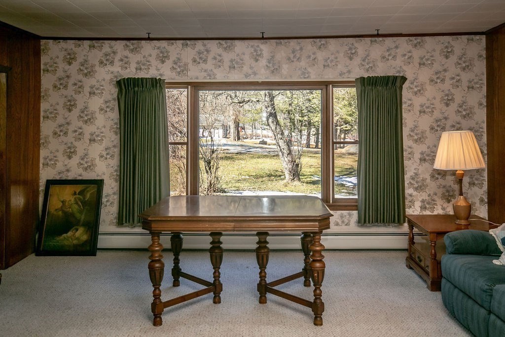 231 River Road Florida, MA 01367 - Photo 18 of 40 a workspace with furniture and a fireplace