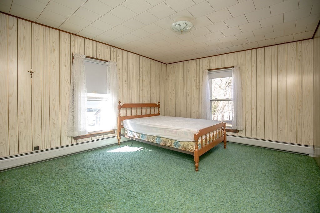 231 River Road Florida, MA 01367 - Photo 24 of 40 a spacious bedroom with a bed and a window