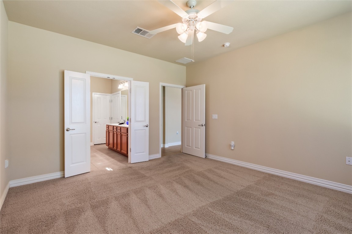 106 Trinity Lane Georgetown, TX 78633 - Photo 15 of 24 wooden floor in an empty room with a window
