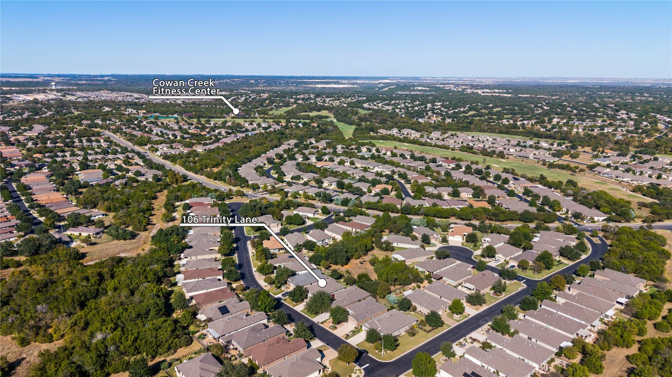 106 Trinity Lane Georgetown, TX 78633 - Photo 23 of 24 an aerial view of residential building with parking and city view