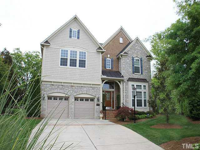 2259 Clayette Court Raleigh, NC 27612 - Photo 1 of 25 a front view of a house with garden